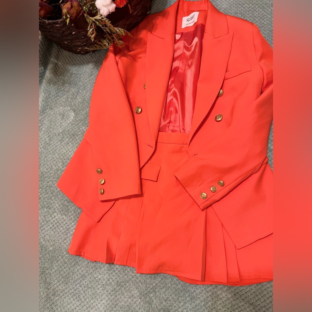 Blazer with skirt short attached underneath the skirt.